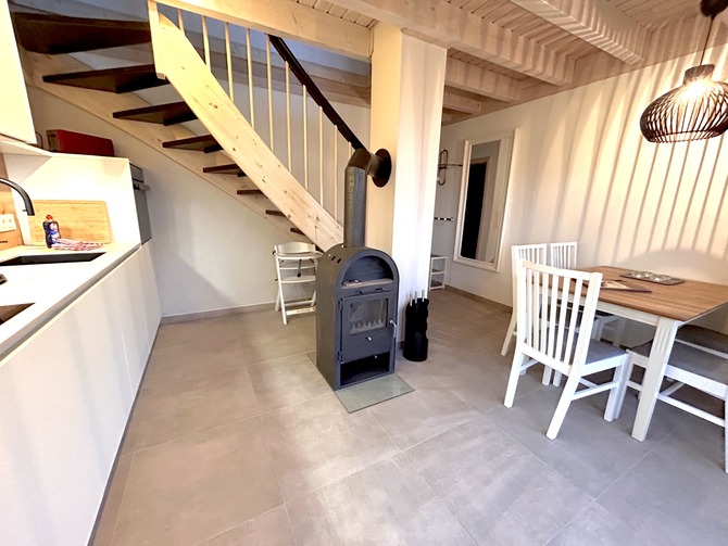 Ferienhaus in Sierksdorf - Pippis Ostsee-Traum - K&uuml;che und Essbereich mit Ausgang auf die Terrasse