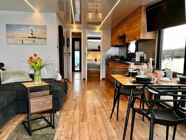 Ferienwohnung in Heiligenhafen - Traum-Hausboot "Mountainstreet 29" mit f&uuml;hrerscheinfreiem Motorboot - Bild 2